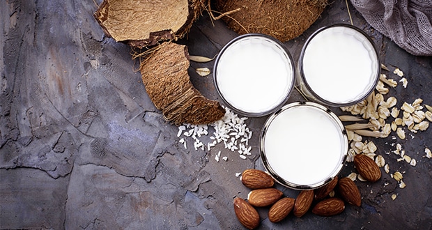 Oat, coconut and almond milk. Non-dairy vegan drink. Selective focus