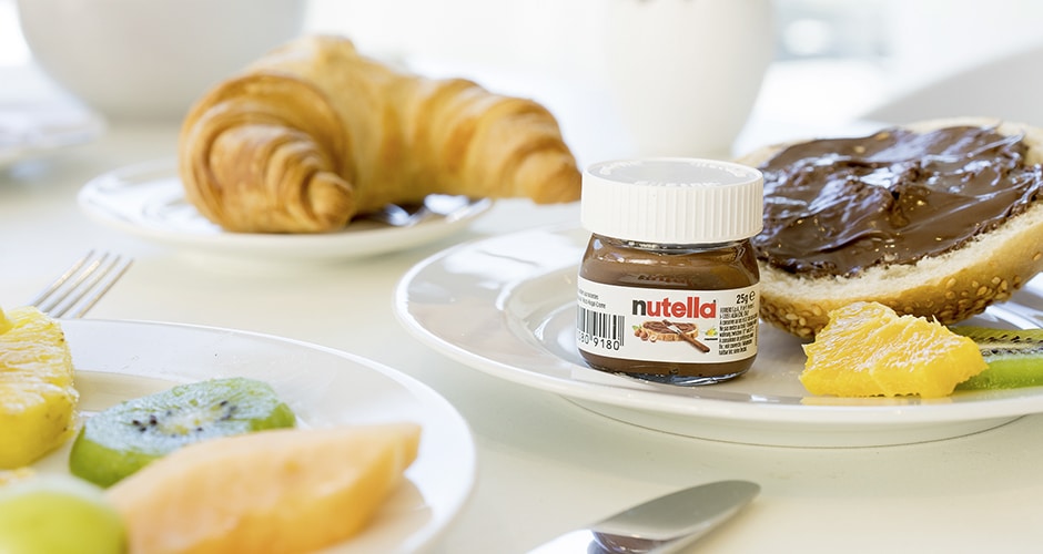 Portionspackungen wie diese Nutella von Hellma ergänzen fast jedes Frühstücksbuffet.
